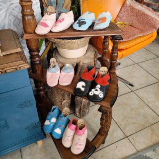 Didoodam slippers on a display stand